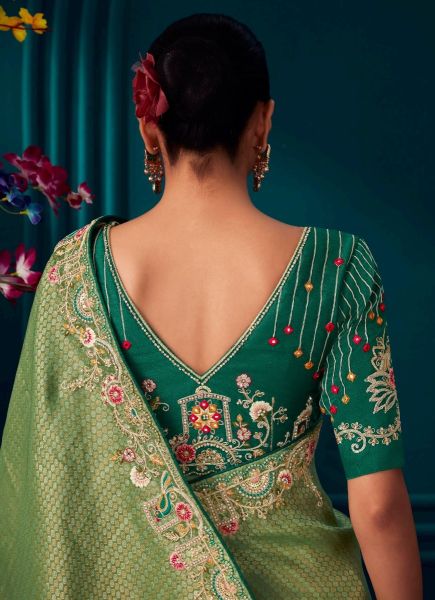 Light Green Kanjivaram Silk Wedding-Wear Saree With Handwork