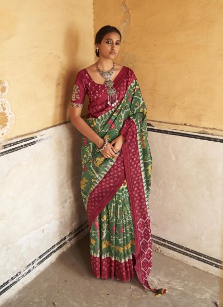 Olive Green & Wine Red Silk Saree With Ikkat Print & Tassels For Parties